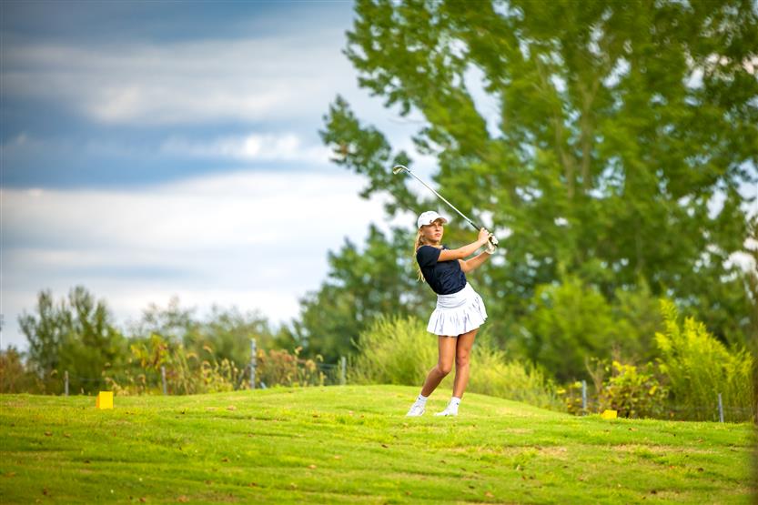 Students play golf